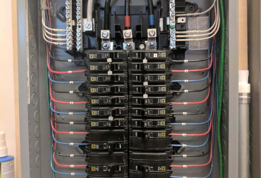 Open breaker panel with neatly wired circuits